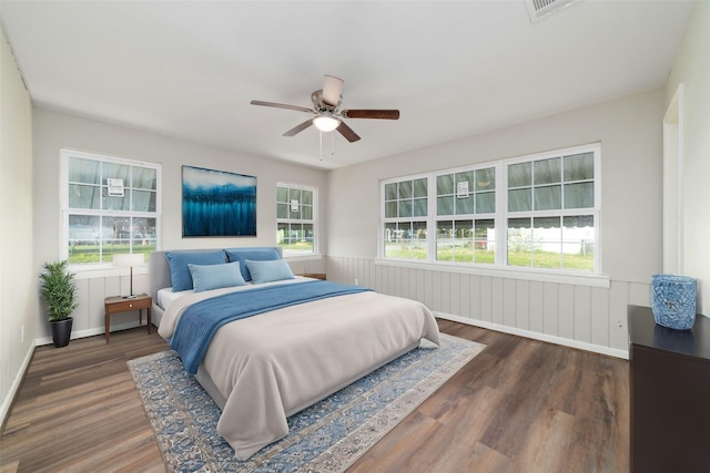 800 E Adoue St, Baytown, TX 77520 - bedroom with wood finished floors and ceiling fan