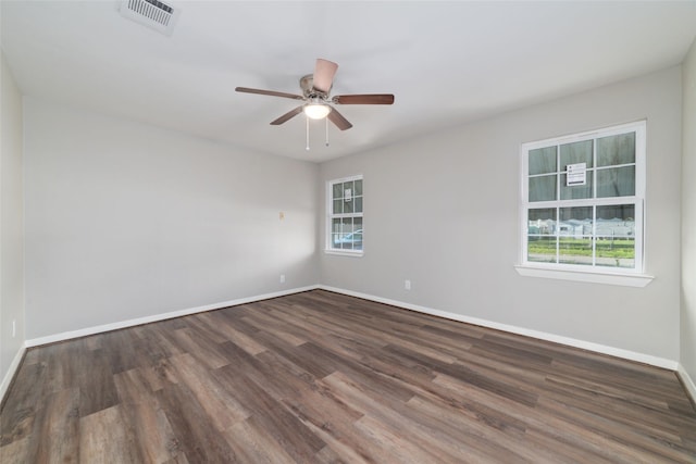 800 E Adoue St, Baytown, TX 77520 - spare room featuring plenty of natural light, wood finished floors, and a ceiling fan
