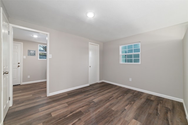 800 E Adoue St, Baytown, TX 77520 - empty room featuring dark wood-type flooring and recessed lighting