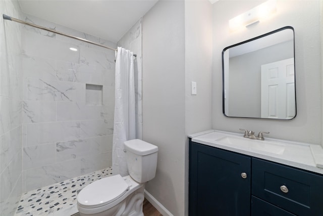 800 E Adoue St, Baytown, TX 77520 - bathroom featuring vanity and a tile shower