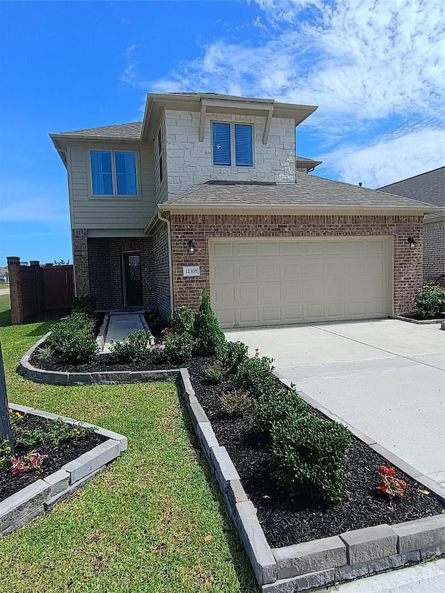 12303 Sterling Oak Dr, Humble, TX 77044 - view of front facade with brick siding and concrete driveway