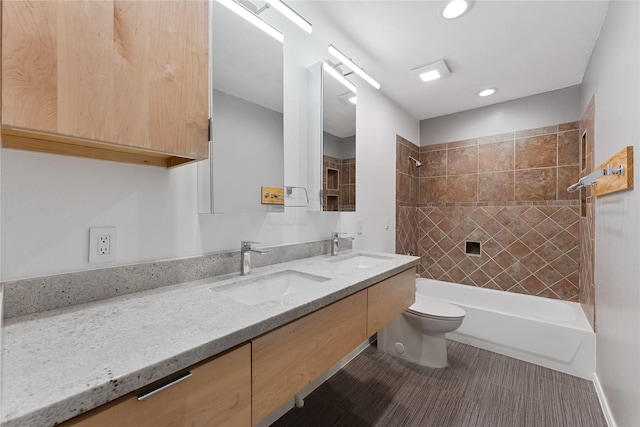 2623 Woodridge Cove Dr, Houston, TX 77087 - bathroom with double vanity, tub / shower combination, and recessed lighting
