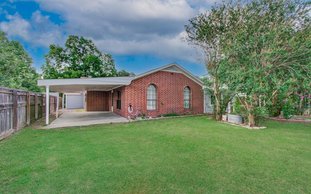 810 Roosevelt St, Sealy, TX 77474 - back of property with brick siding and driveway