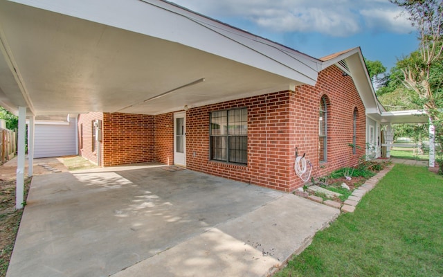 810 Roosevelt St, Sealy, TX 77474 - view of patio with an attached carport
