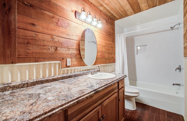 810 Roosevelt St, Sealy, TX 77474 - bathroom with vanity, shower / bath combo, wooden walls, hardwood / wood-style floors, and wooden ceiling