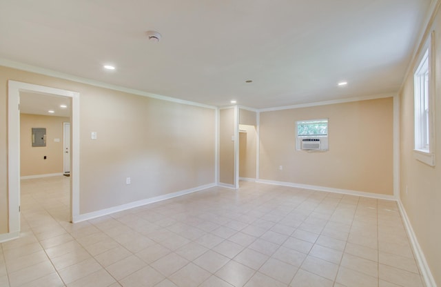 810 Roosevelt St, Sealy, TX 77474 - unfurnished room with electric panel, ornamental molding, recessed lighting, light tile patterned floors, and a smoke detector