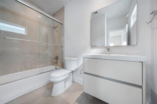 5509 Paraiso Pl, Houston, TX 77091 - full bath with vanity, combined bath / shower with glass door, and tile patterned floors