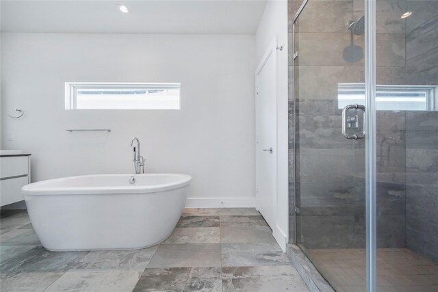 5509 Paraiso Pl, Houston, TX 77091 - bathroom with a soaking tub, a shower stall, and vanity