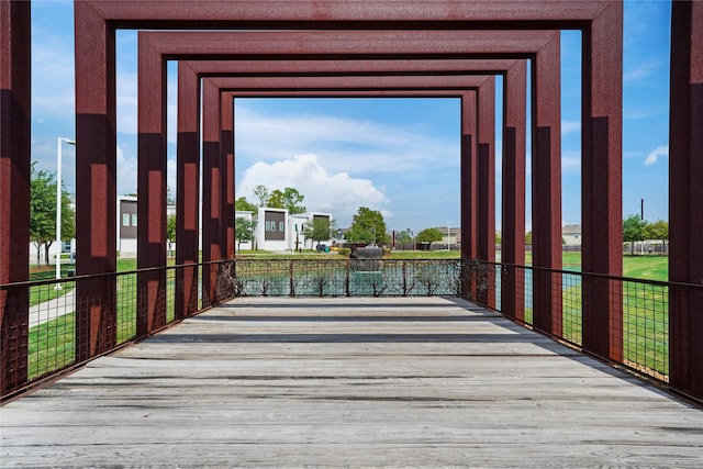 5509 Paraiso Pl, Houston, TX 77091 - doorway featuring wood finished floors and a water view