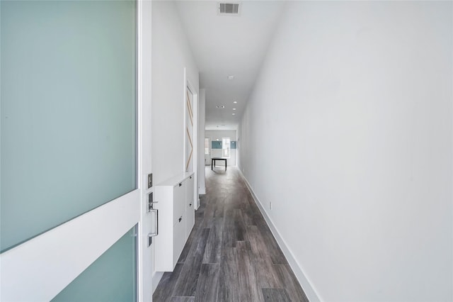 5509 Paraiso Pl, Houston, TX 77091 - corridor featuring dark wood-style flooring and recessed lighting