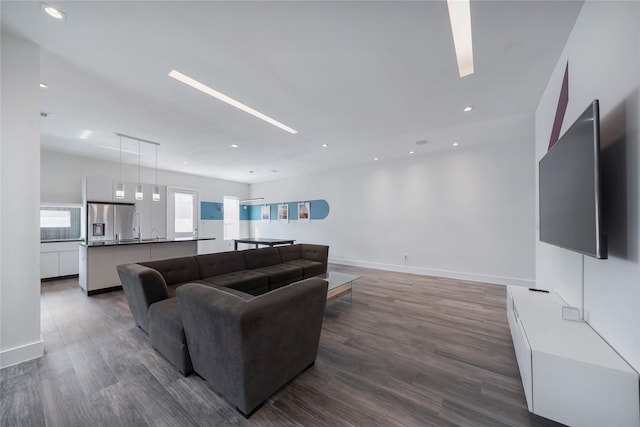 5509 Paraiso Pl, Houston, TX 77091 - living room with dark wood-style floors and recessed lighting