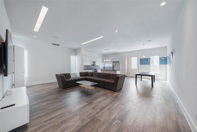 5509 Paraiso Pl, Houston, TX 77091 - living area with wood finished floors and recessed lighting