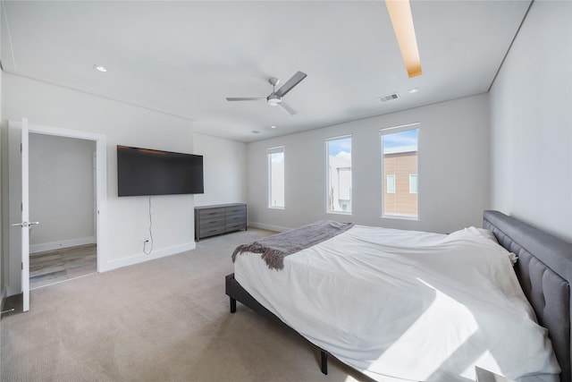 5509 Paraiso Pl, Houston, TX 77091 - bedroom featuring light carpet and ceiling fan