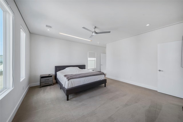 5509 Paraiso Pl, Houston, TX 77091 - carpeted bedroom featuring multiple windows and ceiling fan