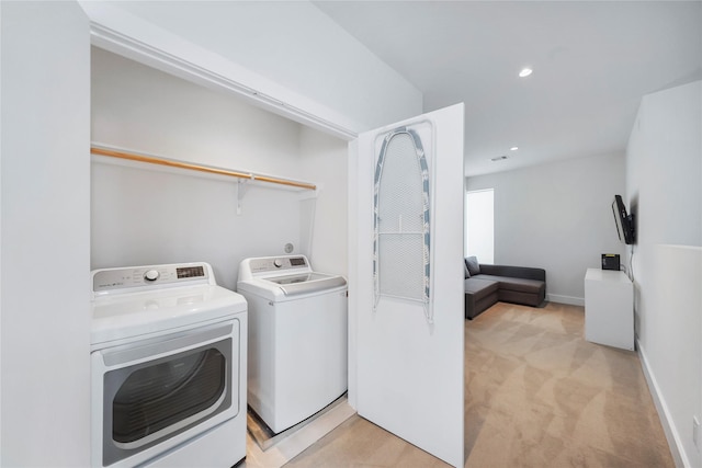 5509 Paraiso Pl, Houston, TX 77091 - laundry room featuring washer and dryer, light carpet, and recessed lighting