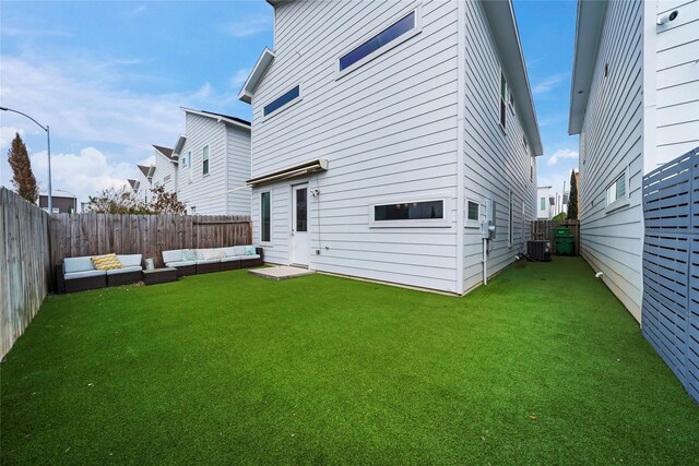 5509 Paraiso Pl, Houston, TX 77091 - rear view of house featuring an outdoor living space and a fenced backyard