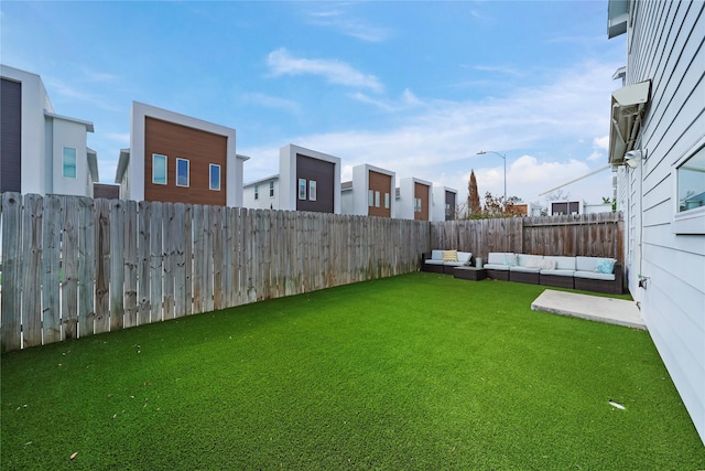 5509 Paraiso Pl, Houston, TX 77091 - fenced backyard featuring outdoor lounge area