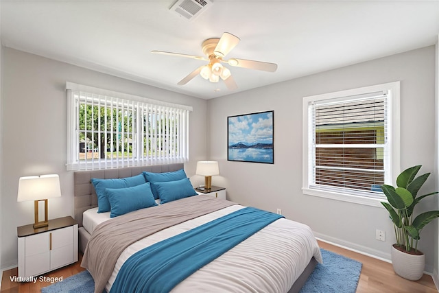 4517 W 43rd St, Houston, TX 77092 - bedroom with wood finished floors and a ceiling fan