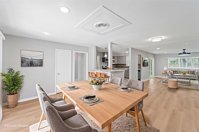 4517 W 43rd St, Houston, TX 77092 - dining area featuring light wood finished floors and recessed lighting