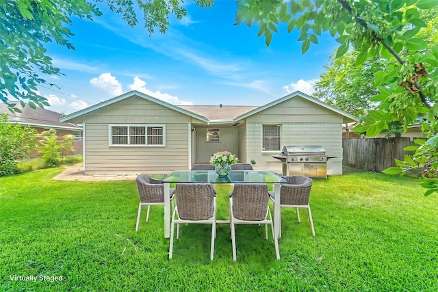 4517 W 43rd St, Houston, TX 77092 - rear view of house featuring brick siding