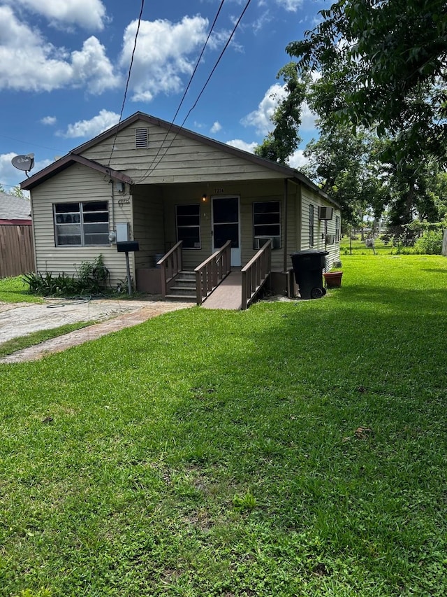 7214 Schuller Rds, Houston, TX 77093 - view of front of home featuring covered porch and a front lawn