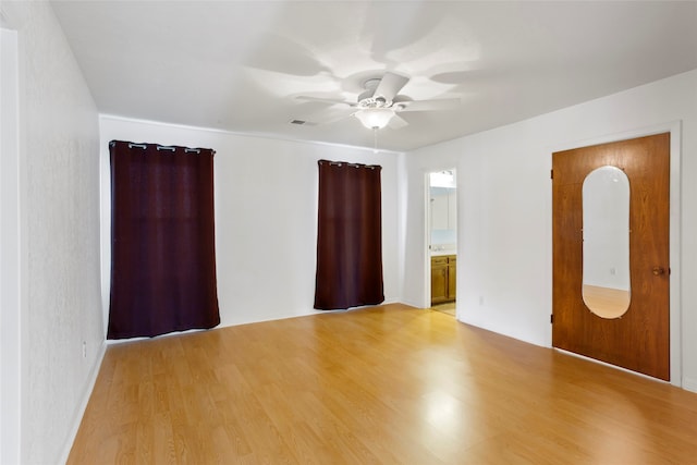 31 Lakeside Dr, Hitchcock, TX 77563 - empty room featuring ceiling fan and light wood-style flooring