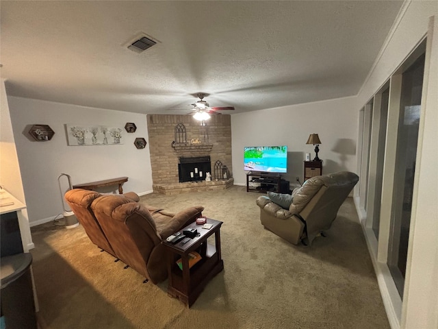 813 Camelot Ln, Friendswood, TX 77546 - carpeted living room with a ceiling fan, a large fireplace, and a textured ceiling