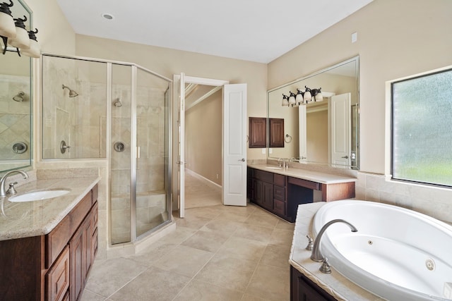 52 Tall Trl, Missouri City, TX 77459 - full bathroom with a shower stall, two vanities, and a tub with jets