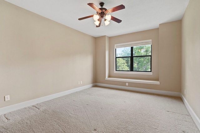 52 Tall Trl, Missouri City, TX 77459 - carpeted spare room featuring baseboards and ceiling fan