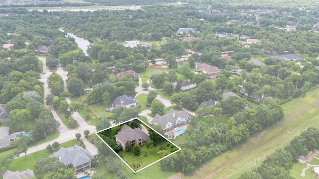 52 Tall Trl, Missouri City, TX 77459 - aerial perspective of suburban area with property parcel outlined and a nearby body of water