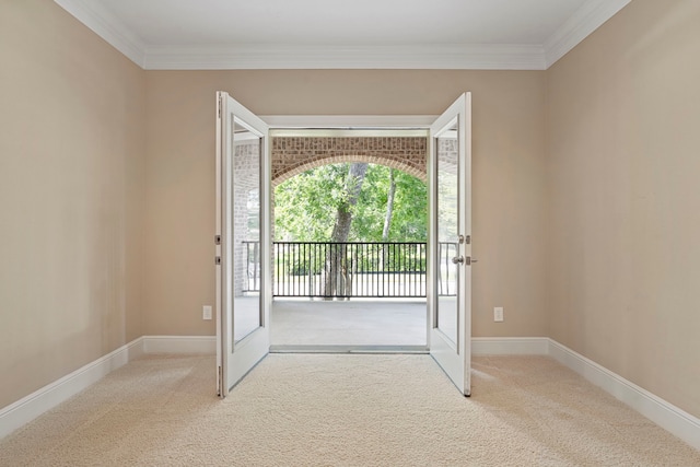 52 Tall Trl, Missouri City, TX 77459 - doorway to outside with crown molding and carpet flooring