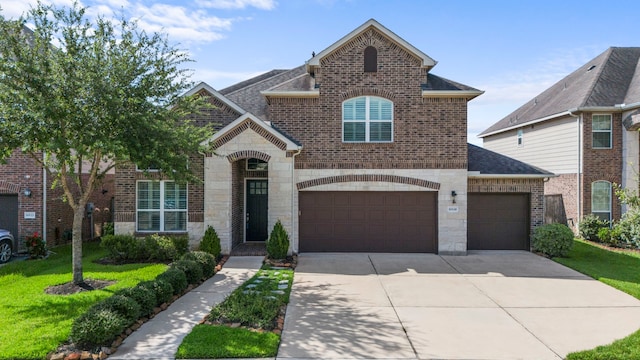 10118 Cypress Path, Missouri City, TX 77459 - view of front facade featuring brick siding, driveway, and a shingled roof