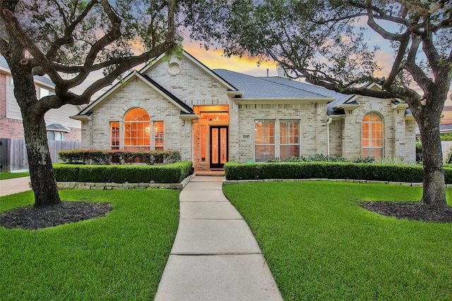 22710 Sierra Lake Ct, Katy, TX 77494 - view of front of property with brick siding and a shingled roof