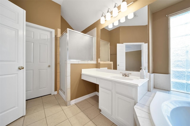 22710 Sierra Lake Ct, Katy, TX 77494 - full bathroom with a stall shower, vanity, a bath, tile patterned floors, and lofted ceiling