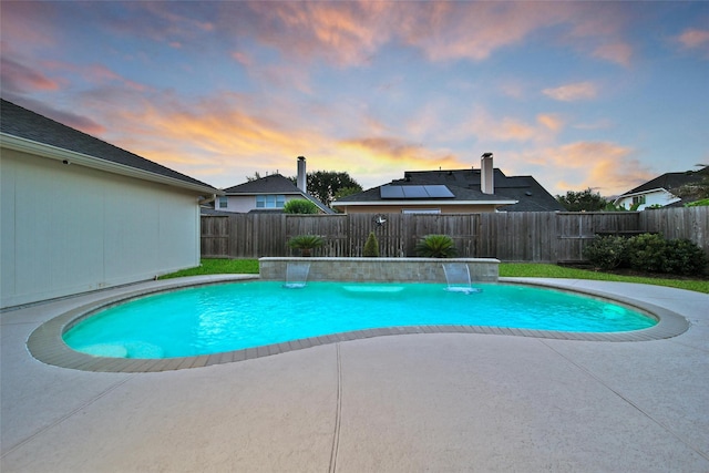 22710 Sierra Lake Ct, Katy, TX 77494 - pool at dusk featuring a fenced backyard and a patio