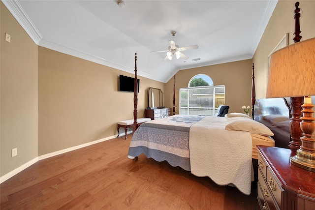 22710 Sierra Lake Ct, Katy, TX 77494 - bedroom featuring light wood-style flooring, crown molding, vaulted ceiling, and a ceiling fan