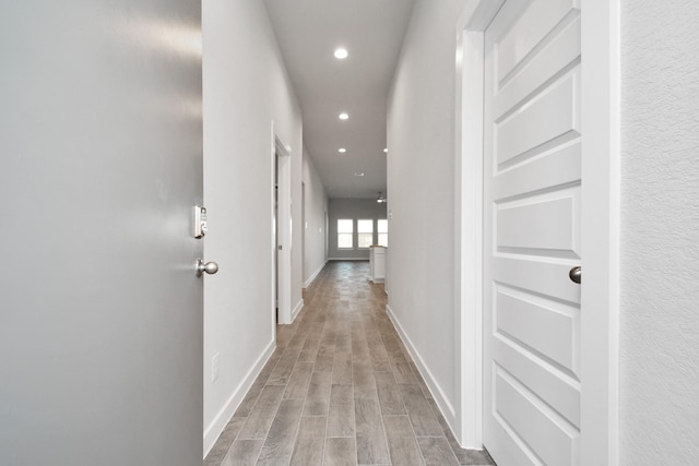 11138 Gardenia Creek Dr, Houston, TX 77044 - corridor featuring recessed lighting and light wood finished floors