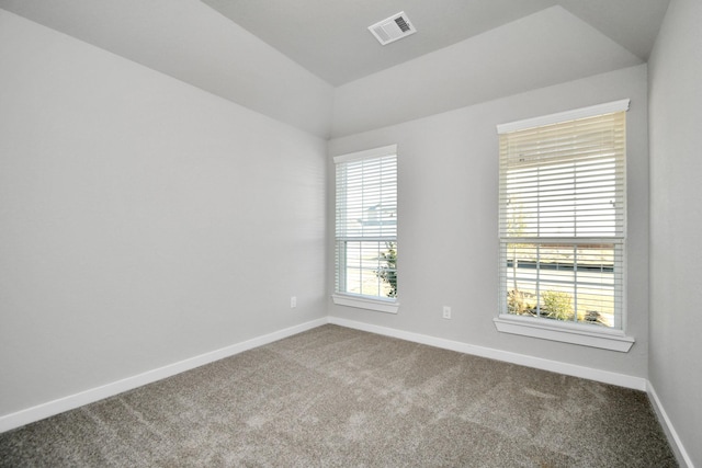 11138 Gardenia Creek Dr, Houston, TX 77044 - empty room with dark colored carpet and vaulted ceiling