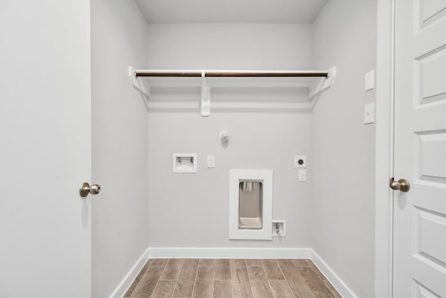 11138 Gardenia Creek Dr, Houston, TX 77044 - washroom featuring hookup for an electric dryer, washer hookup, gas dryer hookup, and wood finished floors