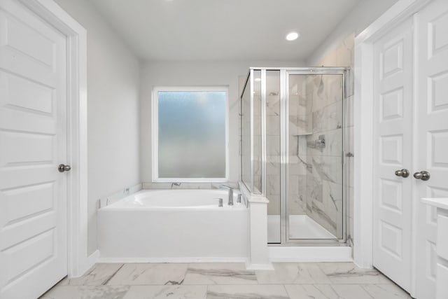 11138 Gardenia Creek Dr, Houston, TX 77044 - bathroom featuring marble look tile flooring, a garden tub, a marble finish shower, and recessed lighting