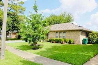 5923 Pine Needle Ln, Pasadena, TX 77505 - view of front of property with a front lawn