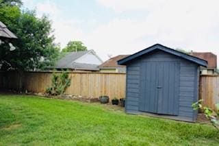 5923 Pine Needle Ln, Pasadena, TX 77505 - view of shed featuring a fenced backyard