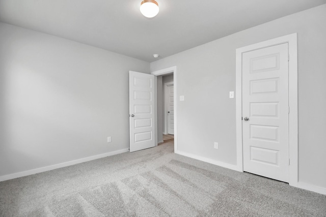 12030 Maple Oak Dr, Houston, TX 77066 - unfurnished bedroom with carpet flooring and baseboards