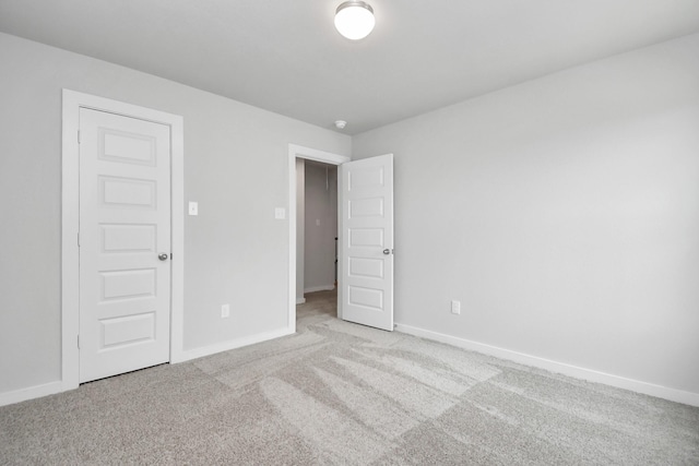 12030 Maple Oak Dr, Houston, TX 77066 - unfurnished bedroom with carpet floors and baseboards