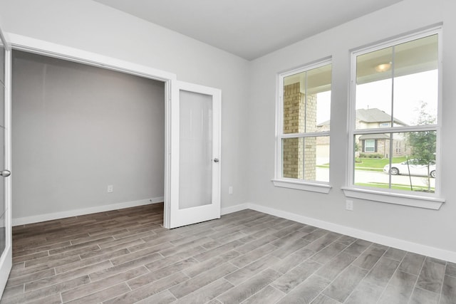 12030 Maple Oak Dr, Houston, TX 77066 - empty room featuring wood finished floors and french doors