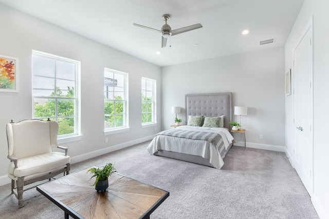 739 Bringhurst St, Houston, TX 77020 - carpeted bedroom with multiple windows, recessed lighting, and a ceiling fan