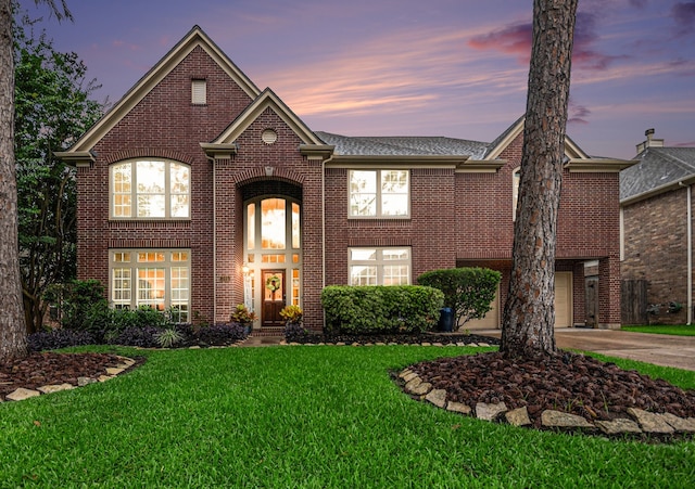 305 Pinnacle Cove Ct, League City, TX 77573 - view of front of property with brick siding, a yard, and concrete driveway