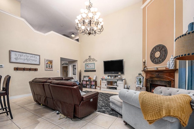 305 Pinnacle Cove Ct, League City, TX 77573 - living area with light tile patterned floors, a chandelier, a high ceiling, and a fireplace