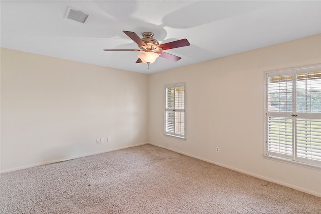 2802 Sandpebble Dr, Seabrook, TX 77586 - carpeted spare room featuring plenty of natural light and a ceiling fan