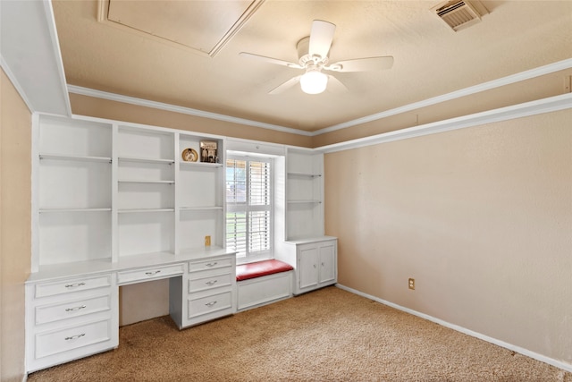2802 Sandpebble Dr, Seabrook, TX 77586 - unfurnished office featuring light carpet, a ceiling fan, crown molding, and built in study area